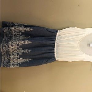 Short embroidered mini dress.